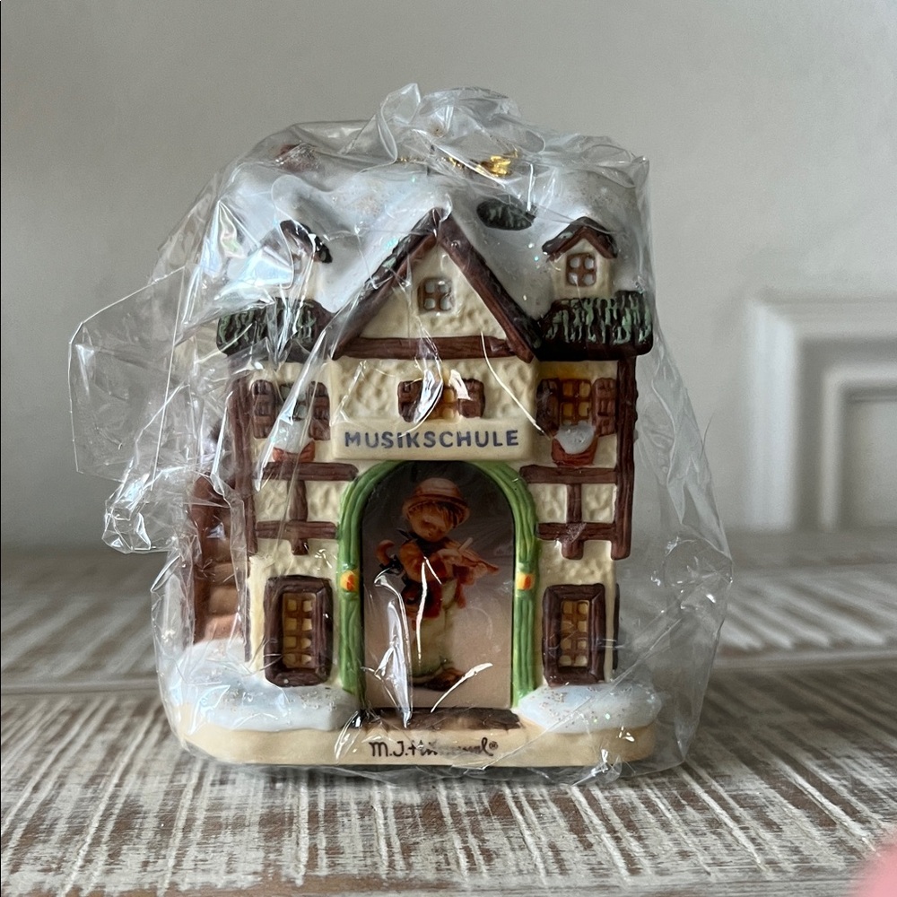 Hummel Bavarian Christmas village ornament “practice makes perfect”